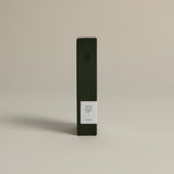 Minimalist dark green box labeled ‘002 Bright Side – Energy’ by FORGRAVE, standing upright on a beige background.