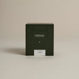 Dark green box labeled ‘FORGRAVE Fine Tea Leaves and Tisanes, 004 White Blend Avant Garden on a beige background.