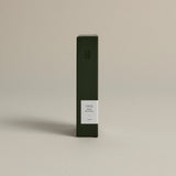 Minimalist dark green box labeled ‘005 Mint Mantra – Calm’ by FORGRAVE, standing upright on a beige background.