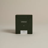 Dark green box labeled ‘FORGRAVE Fine Tea Leaves and Tisanes, 005 Herbal Blend Mint Mantra’ on a beige background.