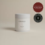 White tea canister labeled ‘002 Bright Side Black Blend’ on a beige background.