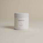 White tea canister labeled ‘003 Boy's Club Black Blend’ on a beige background.