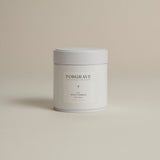 White tea canister labeled ‘004 Avant Garden White Blend’ on a beige background.